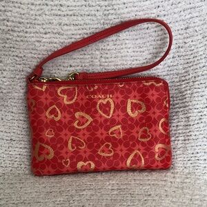 Coach Red Wristlet with Gold Heart Pattern